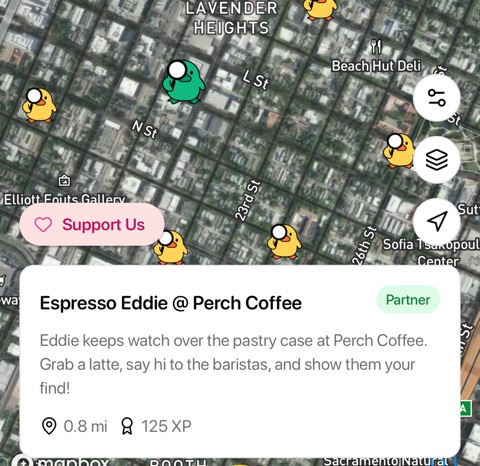 The Where the Duck map showing a green partner duck with its shop callout, "Espresso Eddie @ Perch Coffee"